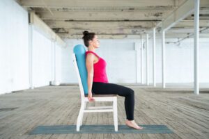 Gentle seated pose for spine relief with props with Jane Hart in Greenville SC