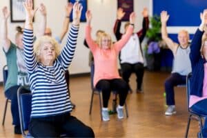 Jane Hart leads chair yoga for seniors with limited mobility in Greenville SC