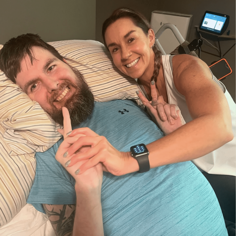 yoga instructor jane hart poses for a photo with a mentally handicapped client after working on his hand strength and coordination during a 1:1 session